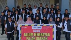 Dorong Kepatuhan Wajib Pajak Lewat Aksi Pemasangan Spanduk