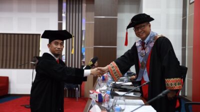 Kadis DPMPTSP Helmy Budiman Promosi Doktor di Pascasarjana Unhas